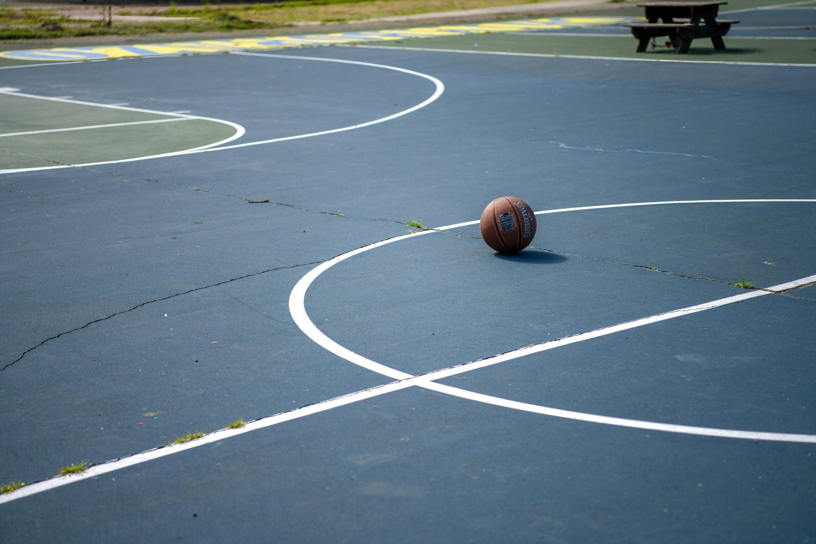 brown basketball on basketball court